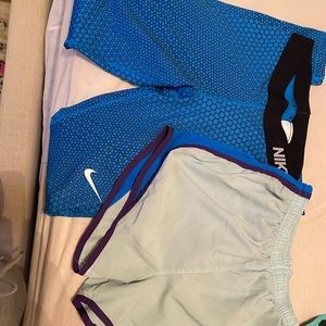 Leggings and Nike shorts.